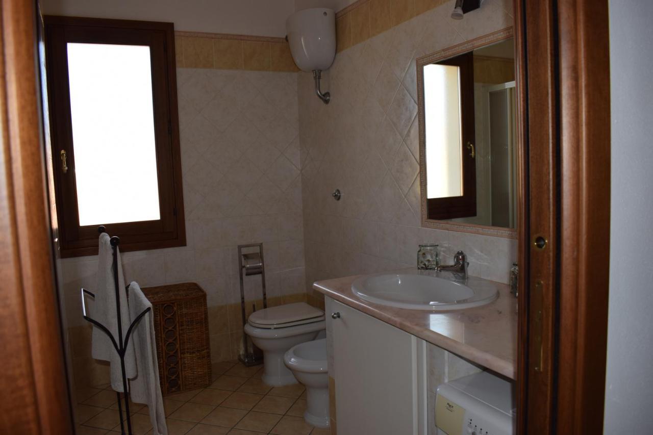 Casa Rosa Dei Venti Villa Pula Bagian luar foto